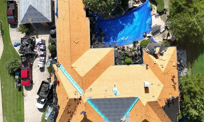 Professional Storm Damage Roof Repair being performed in Helotes